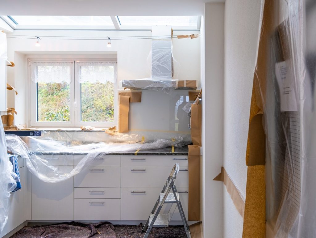 white wooden cabinet near window